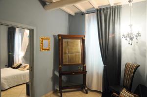 Postel nebo postele na pokoji v ubytování B&B A Casa Dell'Antiquario