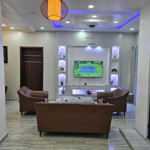 Posezení v ubytování Hen Cap Apartment Services