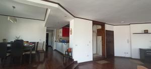 a living room with a table and a dining room at Aqua Maadi Degla Group 199 in Cairo +11 photos