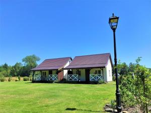 Vonkajšia záhrada v ubytovaní Resort in Kolczewo near West Pomerania Lakes