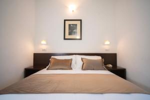 Postel nebo postele na pokoji v ubytování Union Park Hotel