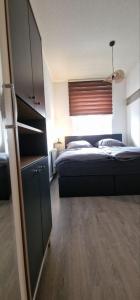 Ein Bett oder Betten in einem Zimmer der Unterkunft Top3 Ferienwohnung mit Fitnessstudio