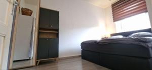Ein Bett oder Betten in einem Zimmer der Unterkunft Top3 Ferienwohnung mit Fitnessstudio