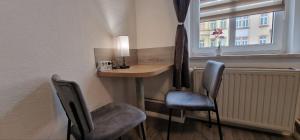 Ein Sitzbereich in der Unterkunft Top3 Ferienwohnung mit Fitnessstudio