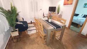 TV a/nebo společenská místnost v ubytování Holiday House Sea Laguna