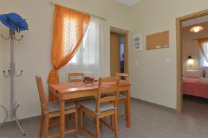 Postel nebo postele na pokoji v ubytování Aggelis Villa + 13 fotografií
