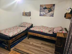 Ένα ή περισσότερα κρεβάτια σε δωμάτιο στο MK Apartment Hron