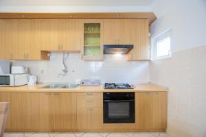 Η κουζίνα ή μικρή κουζίνα στο Apartman Cvita