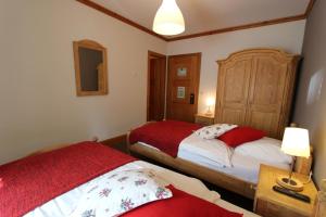 Postel nebo postele na pokoji v ubytování Hôtel de Ville