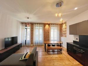 TV a/nebo společenská místnost v ubytování Le Filatier - Centre - Luxe - Balcon - Climatisation