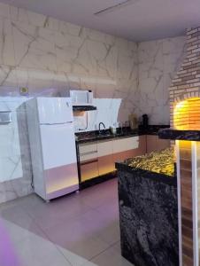 Dapur atau dapur kecil di Leisure Space - Refúgio com Piscina climatizada e churrasqueira