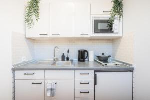 Η κουζίνα ή μικρή κουζίνα στο Green Forest - Teutoburger Wald WLAN Zentral Ruhig Parkplatz Top Anbindung Bielefeld