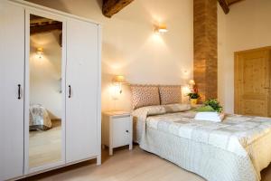 Krevet ili kreveti u jedinici u okviru objekta Agriturismo Ae Cavane