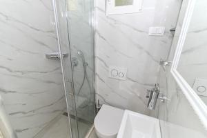 Kúpeľňa v ubytovaní Apartment Sani + 33 fotografií
