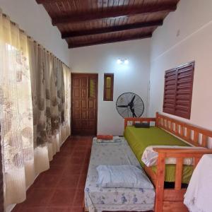 Postel nebo postele na pokoji v ubytování Casa familiar