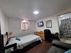 Μια τηλεόραση ή/και κέντρο ψυχαγωγίας στο Casa Miranda Airport +35 φωτογραφίες