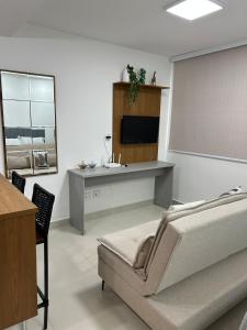 Μια τηλεόραση ή/και κέντρο ψυχαγωγίας στο Apartment studio São Mateus
