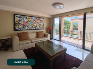 Posezení v ubytování Coralpoint Gardens Suites & Residences