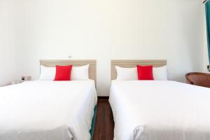 Postel nebo postele na pokoji v ubytování Otousann B&B