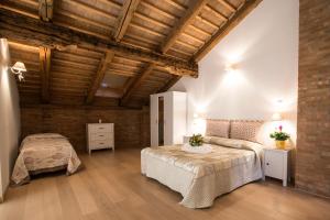 Krevet ili kreveti u jedinici u okviru objekta Agriturismo Ae Cavane