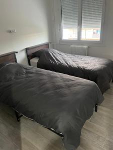 Postel nebo postele na pokoji v ubytování F4 Appartement 3 chambre avec wifi