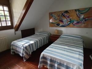 Postel nebo postele na pokoji v ubytování House with a large garden and a pool + 14 fotografií