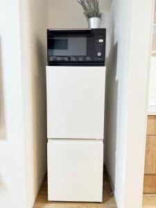 Kuchyň nebo kuchyňský kout v ubytování 日居大正一號館包棟民宿 關西機場直達