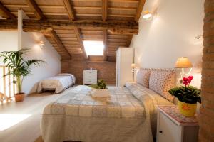 Krevet ili kreveti u jedinici u okviru objekta Agriturismo Ae Cavane