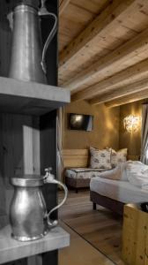 Postel nebo postele na pokoji v ubytování Hotel Orso Grigio