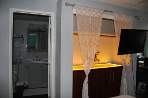 Et badeværelse på Naval Suites + 38 billeder