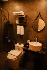 Ein Badezimmer in der Unterkunft Charm House Hue