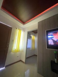 TV a/nebo společenská místnost v ubytování The Roam Inn