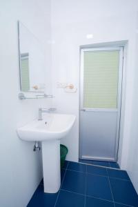 Koupelna v ubytování Suwani Pinnawala Homestay