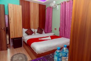 Voodi või voodid majutusasutuse Hotel Old Darbar toas