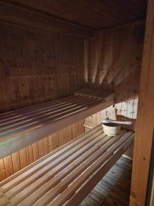 a sauna with two wooden bunk beds in it at Little Paradise Spa Appartement in Gummersbach