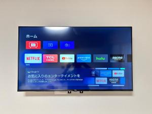 TV a/nebo společenská místnost v ubytování b&天下茶屋店