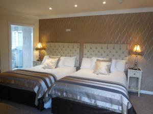 Uma cama ou camas num quarto em Crystal Springs B&B