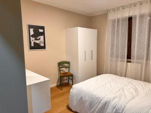 Postel nebo postele na pokoji v ubytování Casa Giulia manerbio