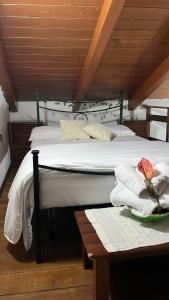 Postel nebo postele na pokoji v ubytování Locazione Turistica Casa Guelfa