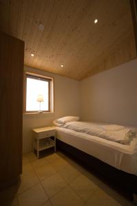 Postel nebo postele na pokoji v ubytování Dimmuborgir Guesthouse