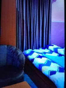 Postel nebo postele na pokoji v ubytování Deep Diamonds hotel and suites