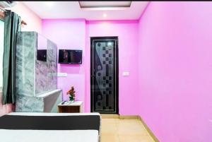 TV a/nebo společenská místnost v ubytování HOTEL-AL BURj INTERNATIONAL