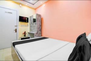 Postel nebo postele na pokoji v ubytování HOTEL-AL BURj INTERNATIONAL