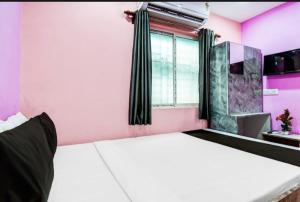 Postel nebo postele na pokoji v ubytování HOTEL-AL BURj INTERNATIONAL