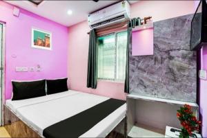 Postel nebo postele na pokoji v ubytování HOTEL-AL BURj INTERNATIONAL