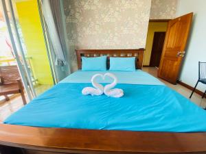 Postel nebo postele na pokoji v ubytování Rak Ban Kerd House + 7 fotografií
