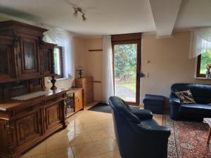 Posezení v ubytování Wunderschöne Ferienwohnung in Thüringen