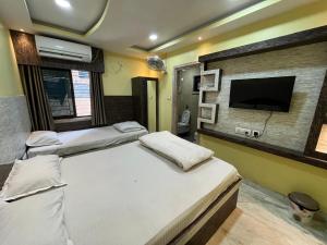 Postel nebo postele na pokoji v ubytování Sidra Guest House + 15 fotografií