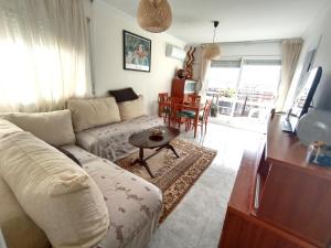 TV a/nebo společenská místnost v ubytování CUNIT PLaYA