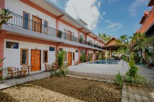 an exterior view of a house with a swimming pool at Garuda Dive & Accomodation Nusa Penida in Nusa Penida